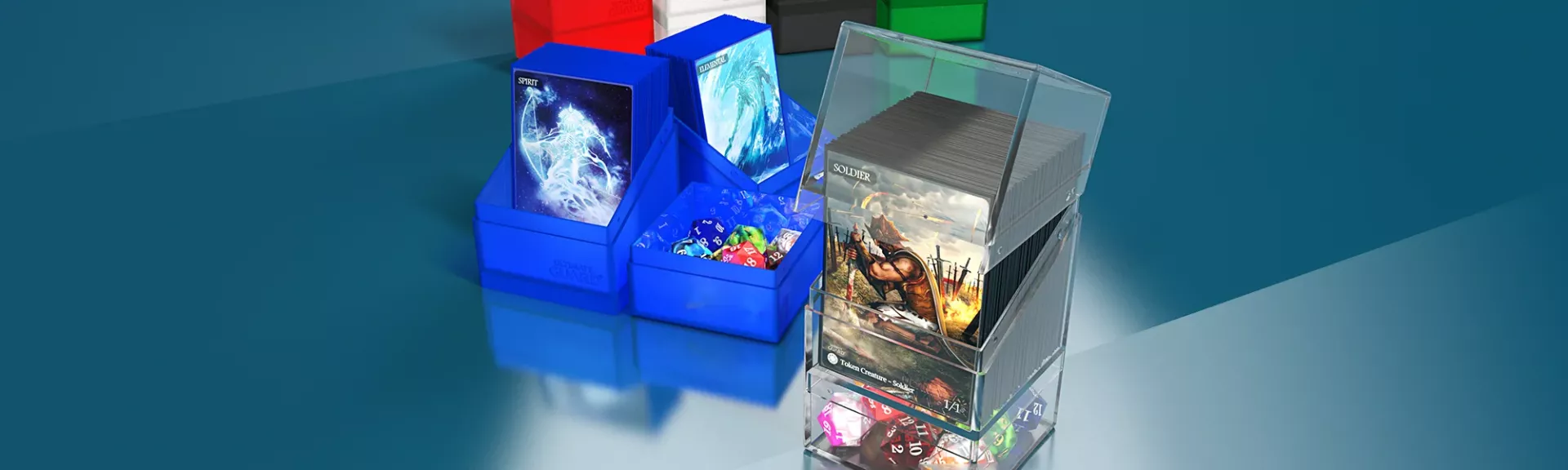 Product Photo of the blue and clear Boulder'n'Tray100+ by Ultimate Guard filled with cards and cubes
