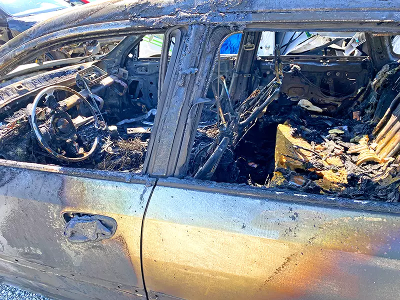 The burned car of James