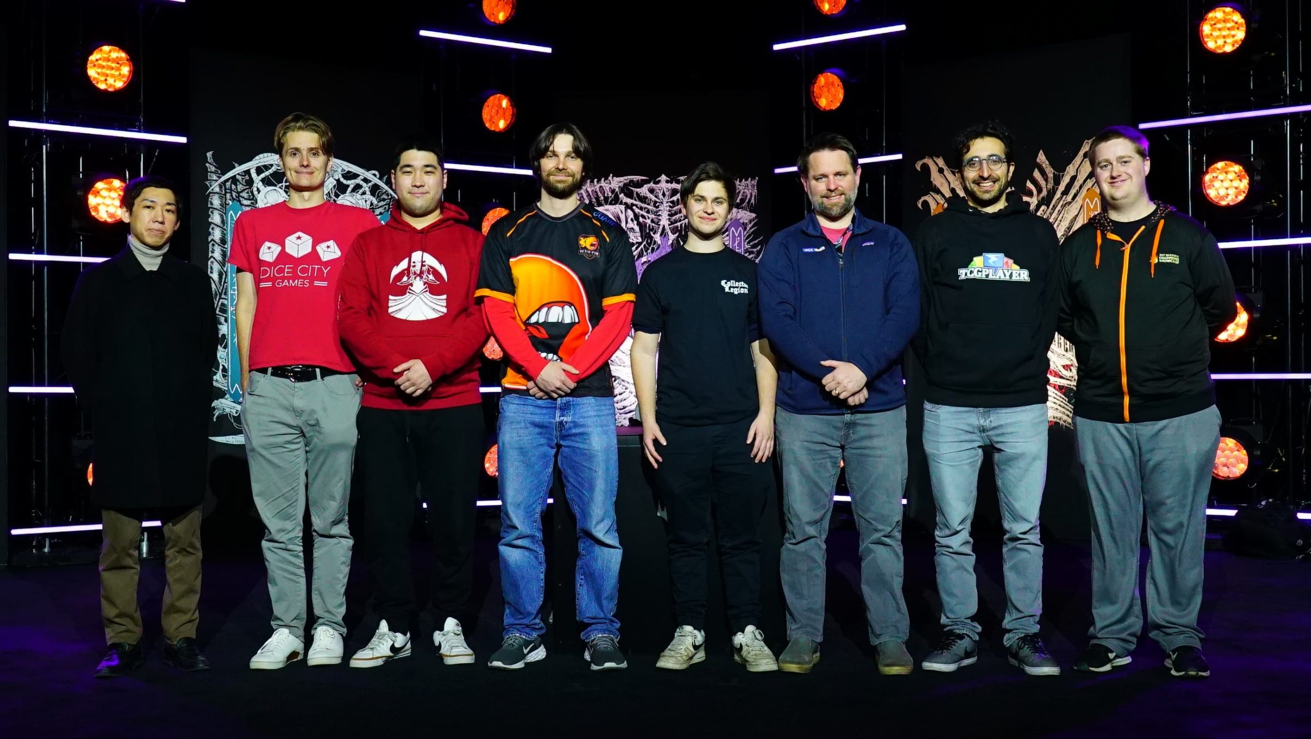 photo of the top 8 from Magic: The Gathering Pro Tour Phyrexia