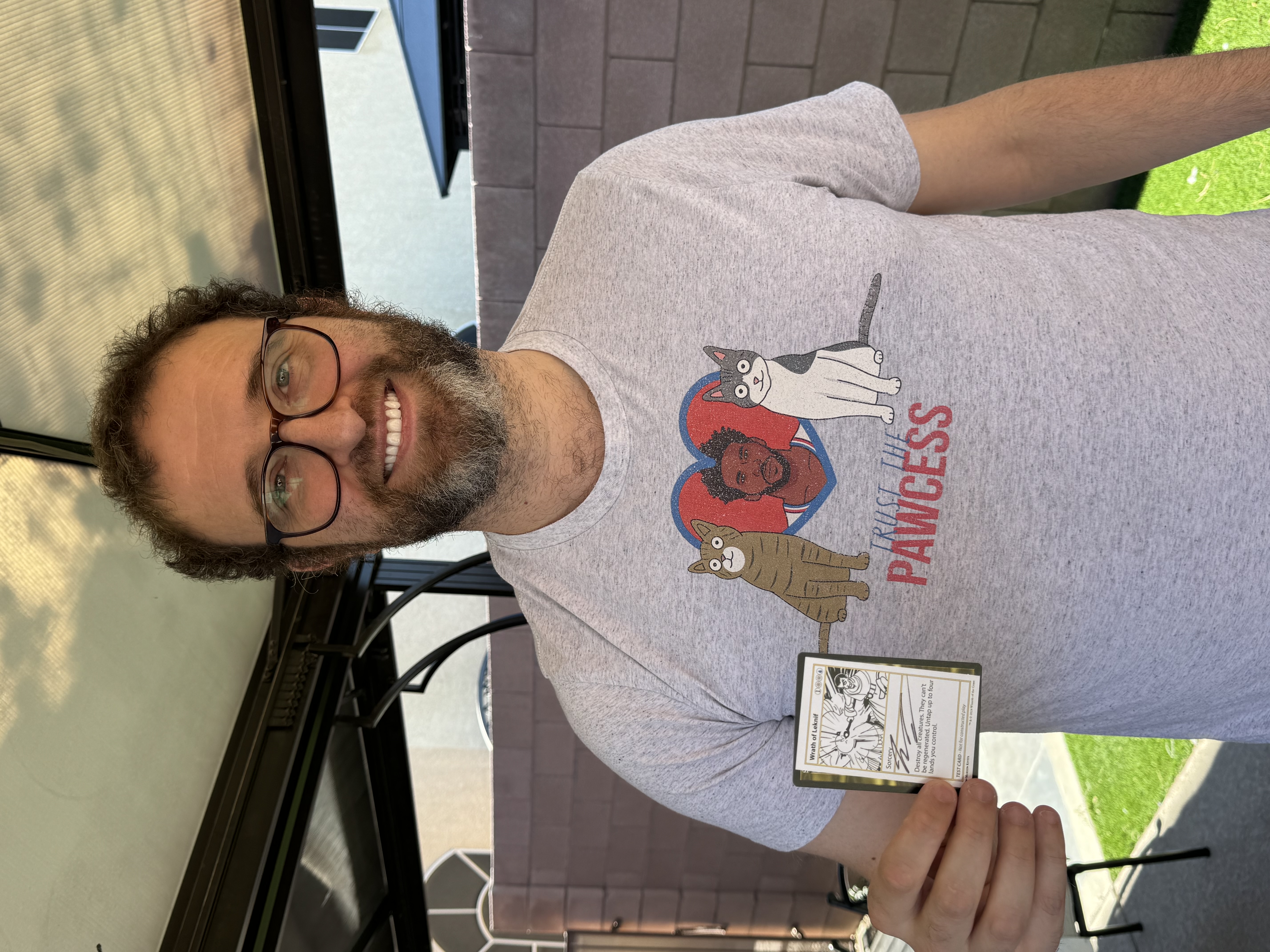 Jon Finkel holding aigned Wrath of Leknif Card from Magic: The Gathering