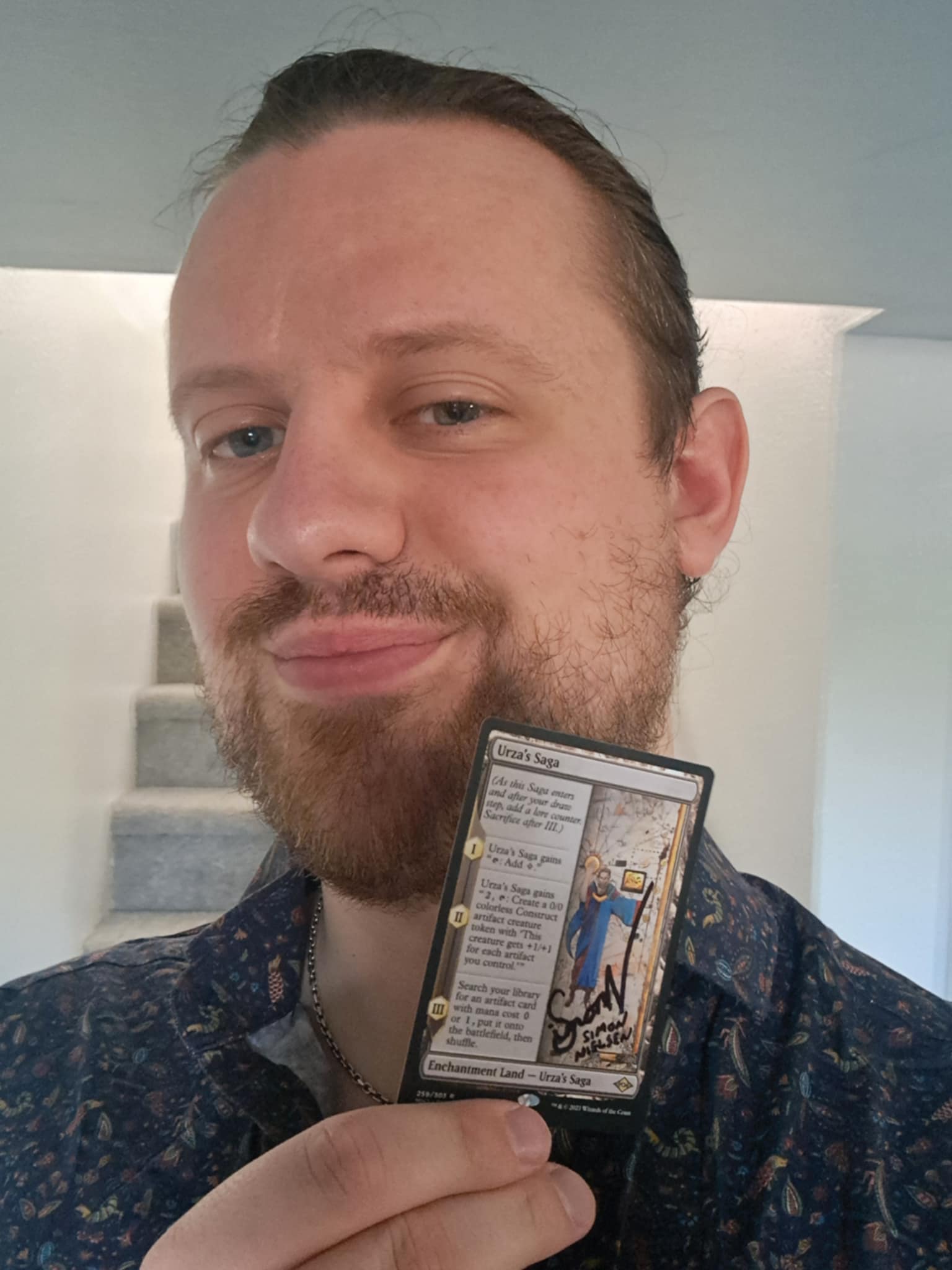 Simon Nielsen holding one of the 4 signed copies of Urza’s Saga from his PT winning deck in Amsterdam
